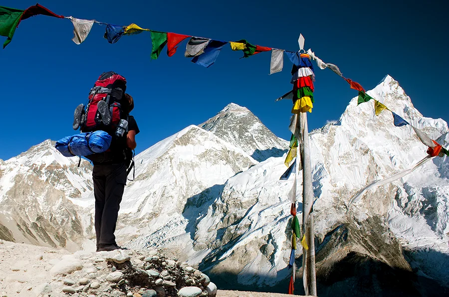 Tourist admiring the evening View of Everest